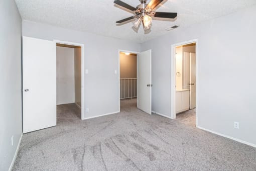 a view of a ceiling with a group of ceiling fans