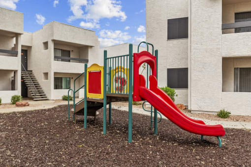 a playground at the whispering winds apartments in pearland, tx