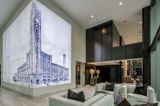 A drawing of a building is on the wall.