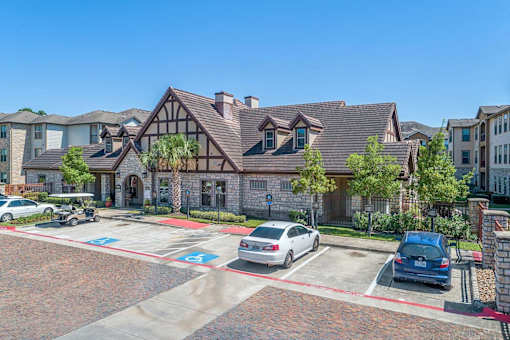 A house with a car parked in front of it.