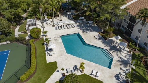 an aerial view of the pool at the resort at longboat key club