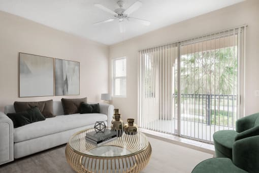 a living room with a couch and a table   and a balcony