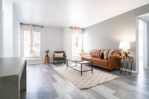 a living room with a couch and a table