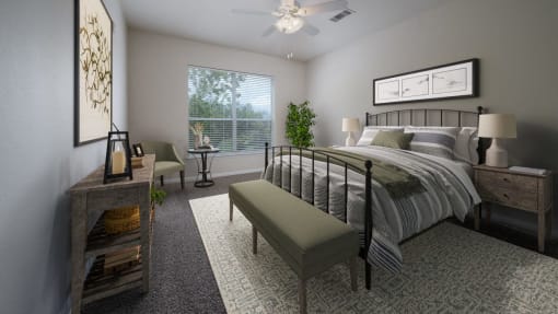 a bedroom with a bed and a ceiling fan