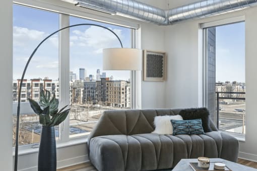 Furnished living room with view of downtown Minneapolis
