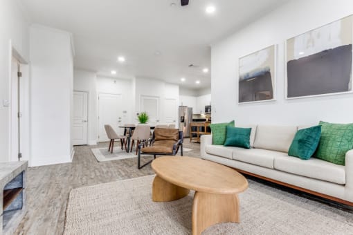 a living room with a couch and a table
