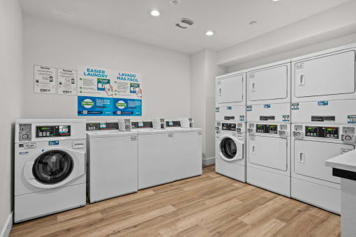 the preserve at ballantyne commons laundry room with washes and dryers