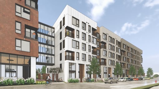 a rendering of an apartment building on a city street
