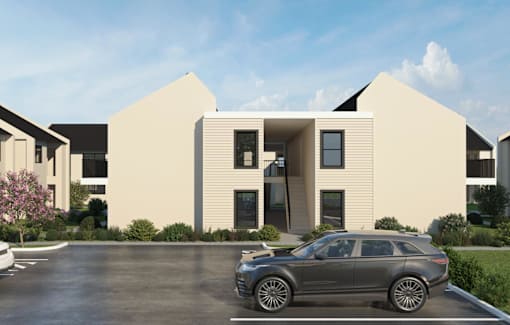 A modern house with a grey car parked in front.