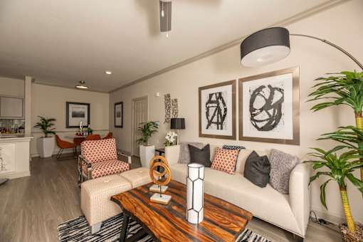 Living room with a white couch at Woodbridge Villas Apartments, Texas, 75048