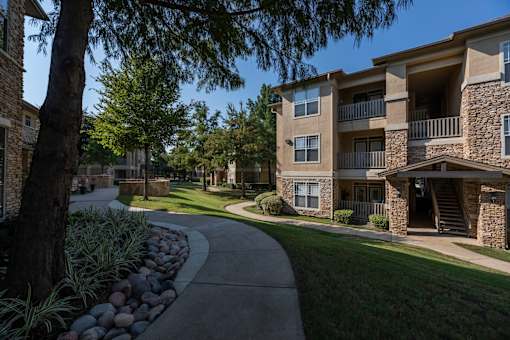 Exterior view at Woodbridge Villas Apartments, Sachse, Texas
