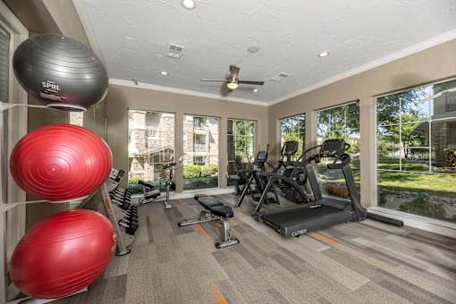 Gym with treadmills at Woodbridge Villas Apartments, Sachse, TX