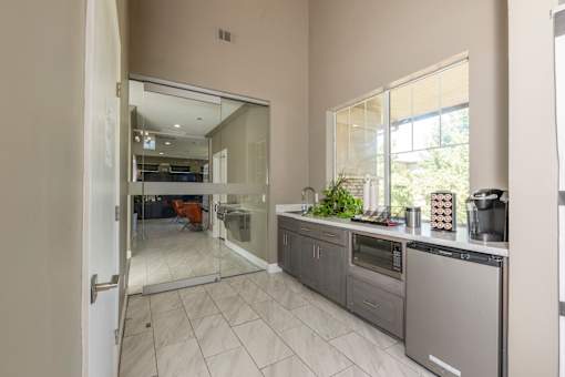 Clubhouse kitchen at Woodbridge Villas Apartments, Sachse, Texas