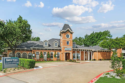 A large building with a sign that says Brixton Leasing Office.
