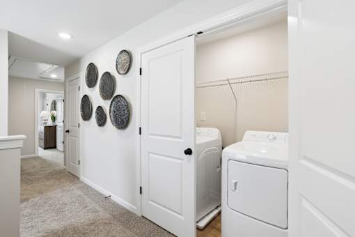 A laundry room with a washer and dryer.