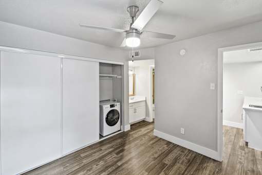 A room with a washing machine in it.