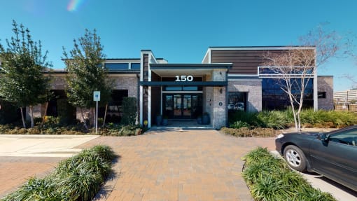 a building with a car parked in front of it