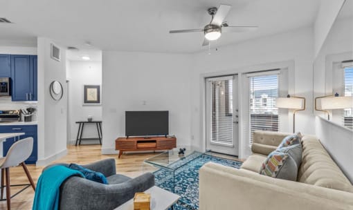 a living room with a couch and a tv