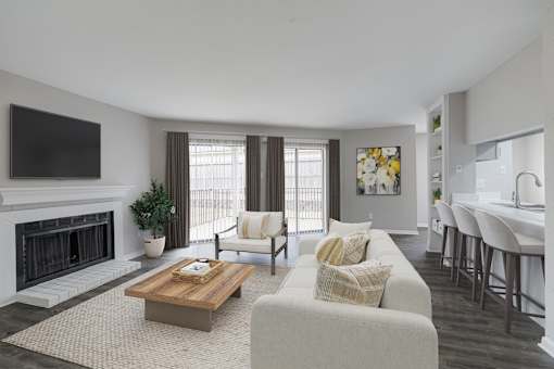 A living room with a fireplace and a couch.