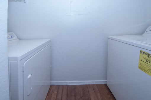 a laundry room with a washer and dryer