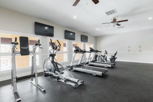 the gym is equipped with treadmills and other exercise equipment