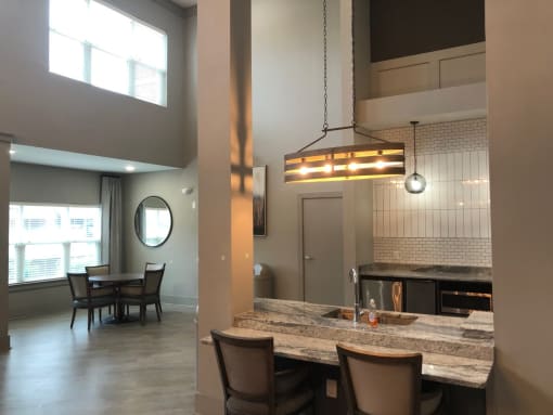 a view of the kitchen and dining area from the living room