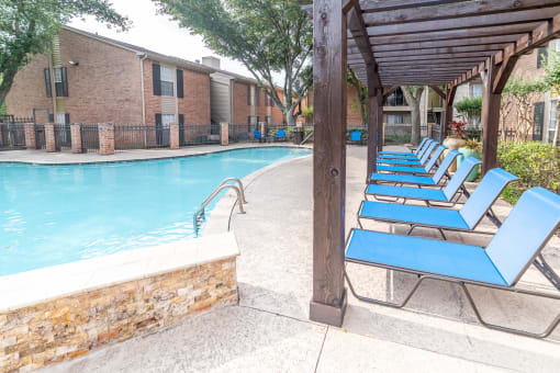 our apartments have a swimming pool with chaise lounge chairs