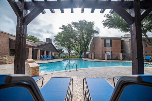 our apartments have a large pool and lounge chairs