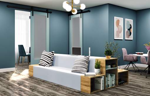 A modern living room with a white sofa and a wooden coffee table.