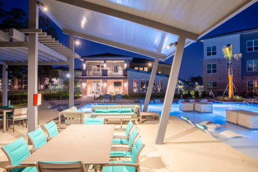 underneath the patio night time pool view
