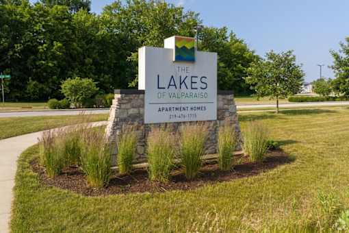 A sign for The Lakes of Valparaiso apartment homes.