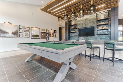 play a game of pool on our billiards table in our game room  at Plat 4 at Research Triangle, North Carolina