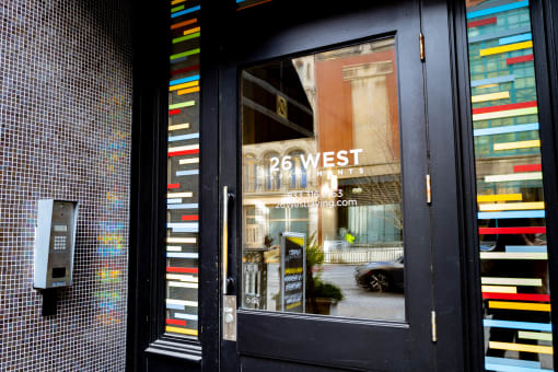 the door to the 25 west boutique at 26 West, Managed by Buckingham Urban Living, Indianapolis