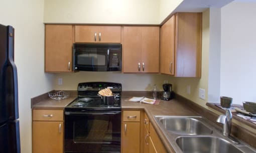 Fully Equipped Kitchen at The Ambassador at Library Square, Indianapolis, IN