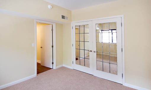 Bedroom With Expansive Windows at The Ambassador at Library Square, Indiana, 46204