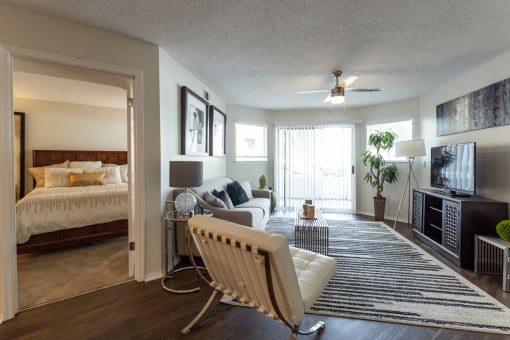 Living room with a couch at Altitude at Blue Ash, Blue Ash