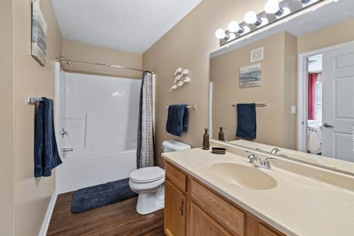Bathroom with large vanity area at Heritage Trail Apartments in Terre Haute, IN.