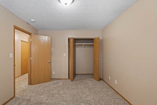 Bedroom with closet at Stadium Lofts Apartments in Terre Haute, IN 47803