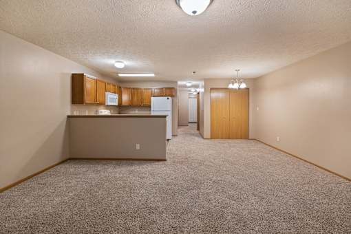 Open kitchen layout and living room at Stadium Lofts Apartments in Terre Haute, IN 47803