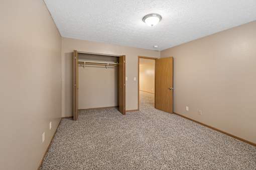 Bedroom and closet at Stadium Lofts Apartments in Terre Haute, IN 47803