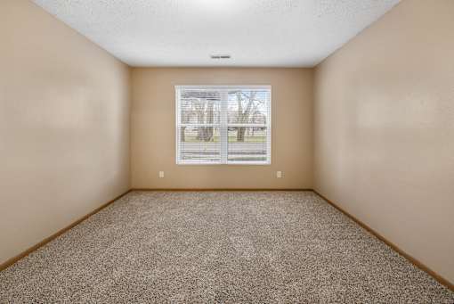 A spacious bedroom at Stadium Lofts Apartments in Terre Haute, IN 47803