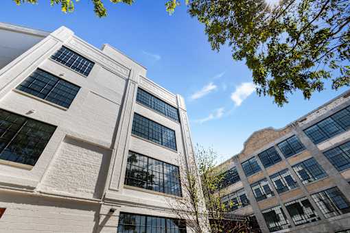 Restored and original 1913 facades meeting at the corner