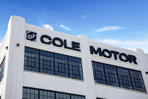 Cole Motor building sign with the original heritage shield logo