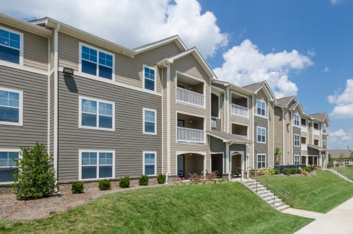 exterior of Lafayette Landing Apartments with grass