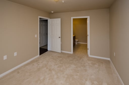 bedroom with carpet in apartment