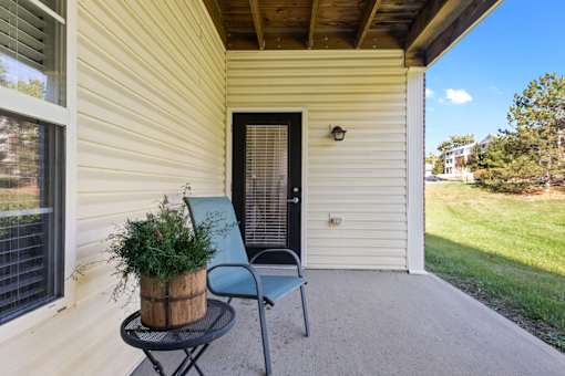 Small Porch with Chair at Fieldstone at Glenwood Crossing, Cincinnati, OH, 45215