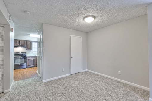 A room with a carpeted floor and a ceiling light at Landmark at Lyncrest Reserve Apartments, Nashville, 37209