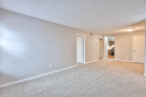 A spacious room with carpeted floor and white walls at Landmark at Lyncrest Reserve Apartments, Nashville, Tennessee