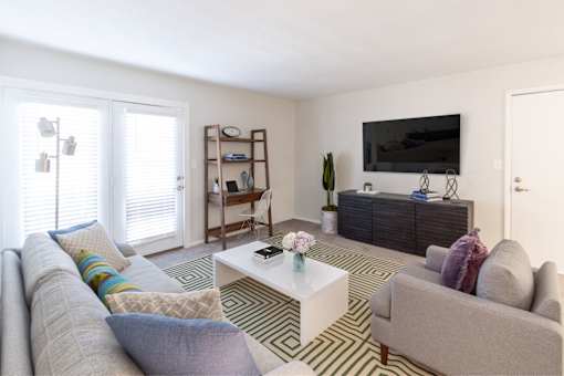 Living Room With TV at Gramercy Apartments, Carmel, IN 46032