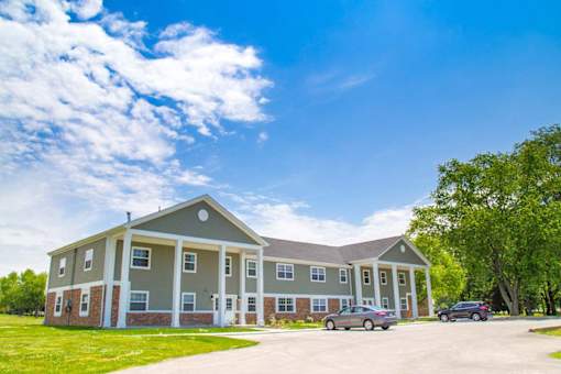 apartment building exterior view at Gramercy Apartments, Carmel, IN 46032